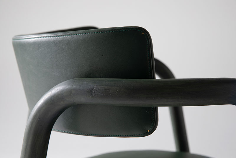 closeup on chair of wood and leather